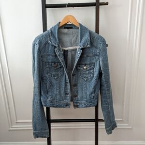 Cropped soft blue denim jean jacket. Size M